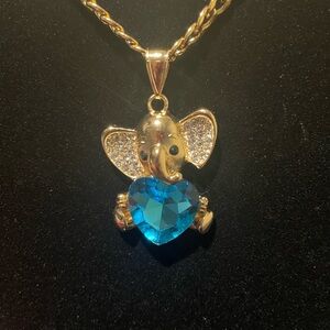 Gold Elephant Pendant Necklace with Blue Heart
